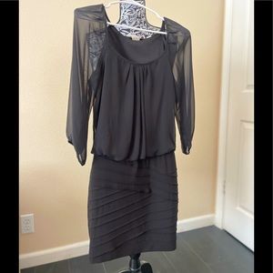 Sheer-sleeved short black mini dress by B Darlin